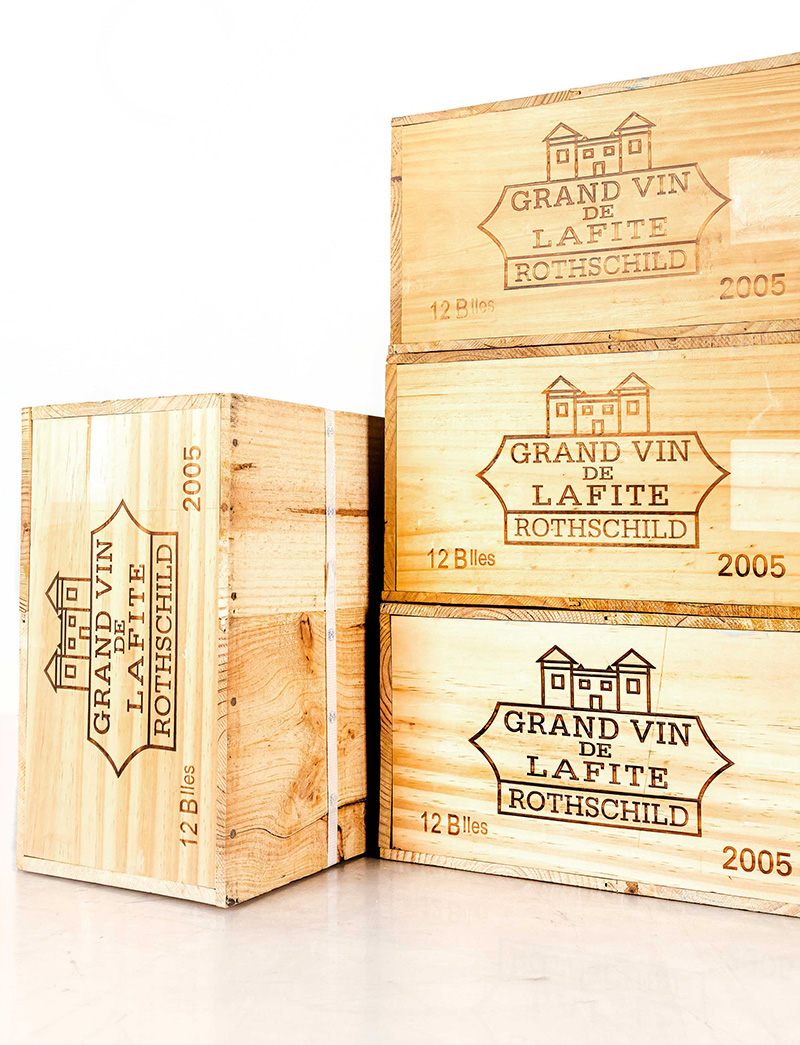 Lot 38-41: 12 bottles each 2005 Chateau Lafite Rothschild in banded OWC